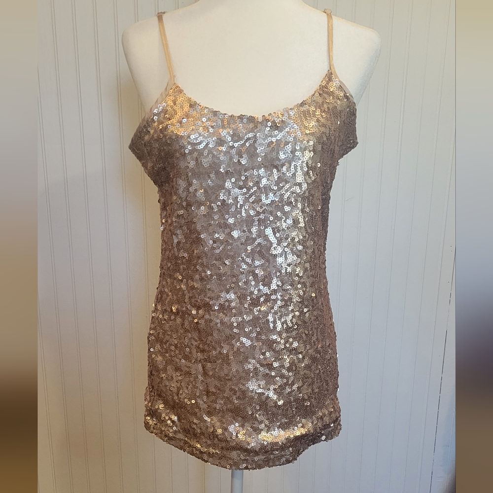 Bke size lg champagne sequence tank top with low cut back.